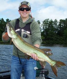 client with catch and released musky in Eagle River, WI